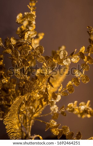 gold patterns on a brown background