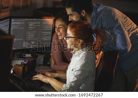 	
Team of programmers working on new project.They working late at night at the office.	
 Royalty-Free Stock Photo #1692472267