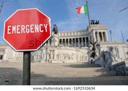 Emergency sign with Altar of the Fatherland in Rome, Italy. Italian government implement emergency measures in order to stop corona virus outbreak and it's  consequences