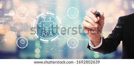 Robotic process automation concept with businessman on blurred abstract background