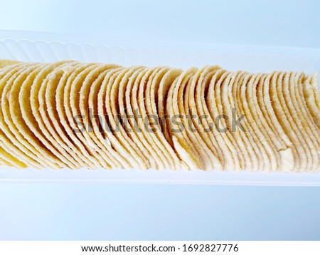 Chips in the box on white background