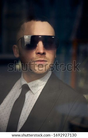 portrait of a young man in a business suit