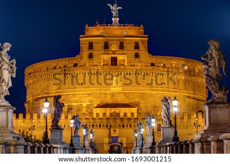 The Castel Sant Angelo and the Sant Angelo bridge in Rome at night Royalty-Free Stock Photo #1693001215