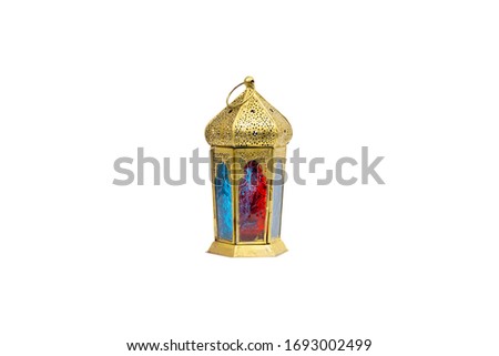 Ramadan lantern or Arabic decoration lamp isolated on white background. Selective focus Royalty-Free Stock Photo #1693002499