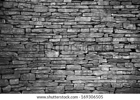 old wall of stone bricks textured background Royalty-Free Stock Photo #169306505