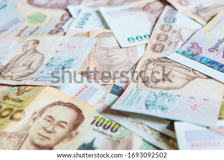 Background of 1000 thb Thai baht value close up, Business finance Royalty-Free Stock Photo #1693092502