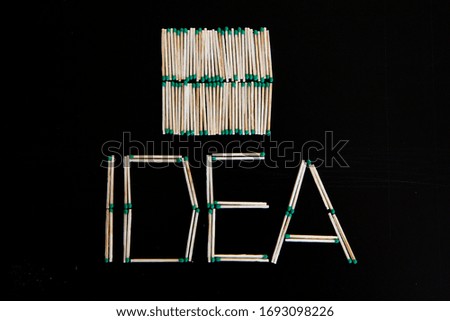 Idea text concept banner . Creative word composition. The word IDEA. Creative concept. Top view,The word IDEA made of wooden letters