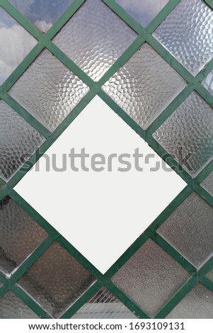 Piece of wrought iron grating on window