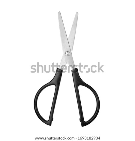 Silver metal open scissors with black plastic handles on white background isolated close up, steel cutting tool for paper, fabric clippers, haircut shears, tailor pair of scissors, nobody