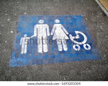 sign for family parking lot
