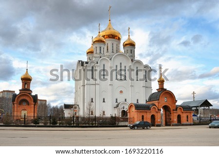 Cathedral of St. Stephen of Perm The Orthodox Spiritual Center in Syktyvkar. Spring clouds over the temple. Royalty-Free Stock Photo #1693220116