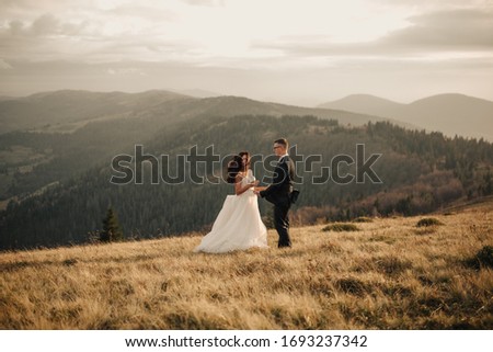 loving couple on top of mountains