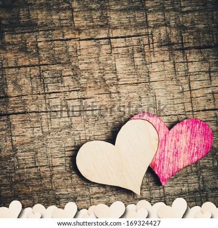 Heart on a wooden background. Background in the style of Valentine's Day. Heart on a wooden background.