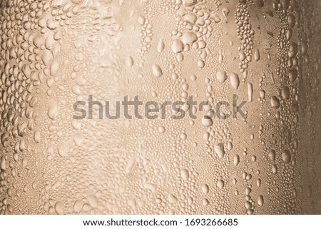 Water drops on the side of the flask.Background & Texture.