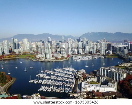 Amazing aerial shot of Vancouver taken this summer , Vancouver is known for amazing holiday destination which is loved by couples and teenagers . Vancouver Skyline looks amazing in the day 