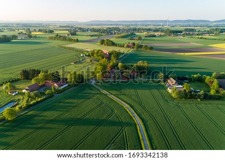 Northern Germany with fields and meadows from the air Royalty-Free Stock Photo #1693342138