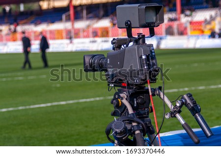 TV camera + broadcasting during a football (soccer) match