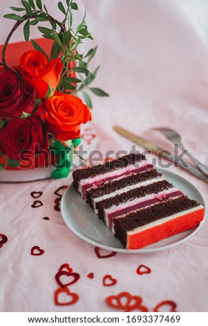 Red wedding cake with flowers on a white background
