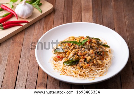 Stir fried capellini pasta with Short Necked Clam .Thai style food