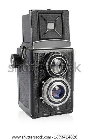 Old fashion twin-lens medium format camera isolated on the white background.