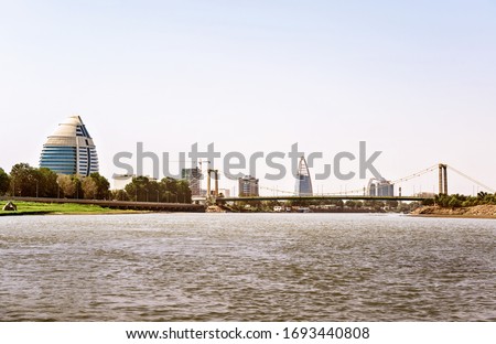 View at Khartoum city scape with Burj Al Fateh hotel, the bridge over river Nile and modern buildings at the background. Royalty-Free Stock Photo #1693440808