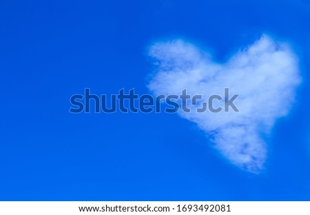 Cloud-shaped heart on a sky.copyspace for text.Concept.
