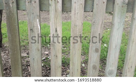 background texture wooden fence grass in the background