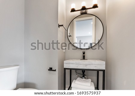 modern, powder room. Contemporary, minimalist style.  Royalty-Free Stock Photo #1693575937