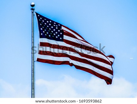 American Flag Waving on Windy Day
