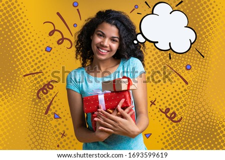 Portrait of smiling cute casually dressed dark skinned girl posing with a bunch of gift boxes in hands isolated over bright colored yellow background. Hand drawn comic pop art style illustrations.
