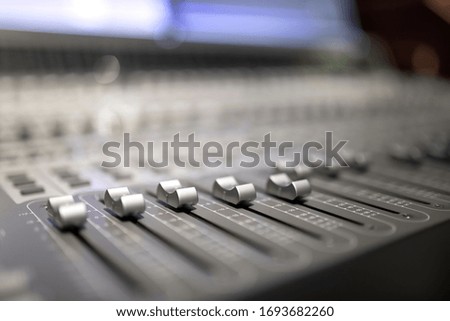 Detail view of digital sound control and edit mixer