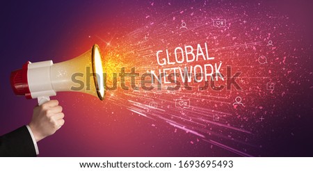 Young woman yelling to loudspeaker with GLOBAL NETWORK inscription, social networking concept