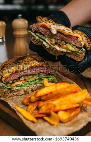 Chopped Marbled Beef Burger
with french fries.