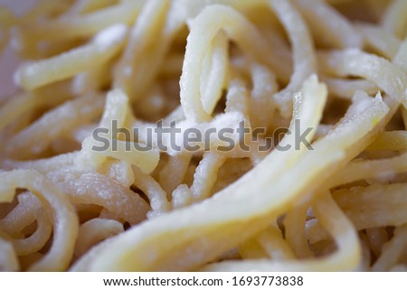 Spoiled spaghetti with mold. Pasta or noodles with white penicillum spores. Old food close up background