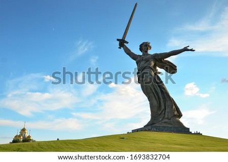Motherland, a huge and famous statue in the Russian city of Volgograd. It rises on Mamaev Kurgan. Royalty-Free Stock Photo #1693832704