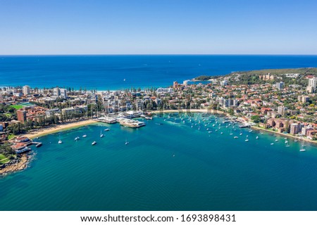 Aerial view on famous Manly Wharf and Manly, Sydney, Australia. View on Sydney harbourside suburb from above. Aerial view on Sydney North Harbour, Manly and Manly Wharf.