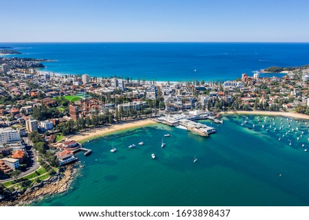 Aerial view on famous Manly Wharf and Manly, Sydney, Australia. View on Sydney harbourside suburb from above. Aerial view on Sydney North Harbour, Manly and Manly Wharf.