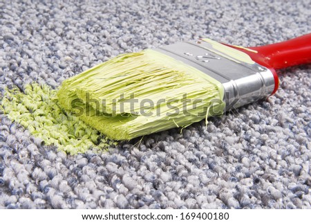 paint brush on stained carpet