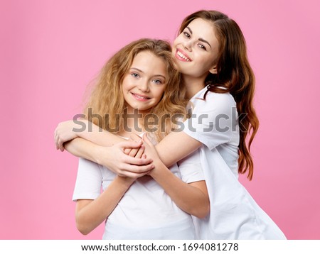 Mom and woman with a child are happy at home