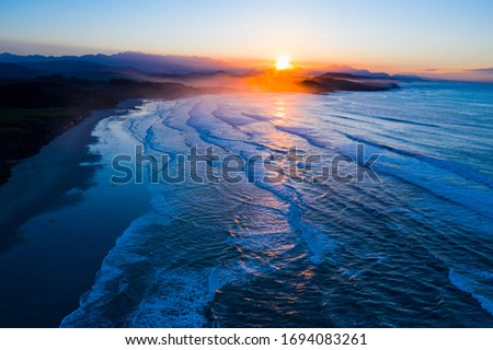 Sunset at Gerra Beach, Oyambre Natural Park, San Vicente de la Barquera Municipality, Cantabrian Sea, Cantabria Autonomous Community, Spain, Europe