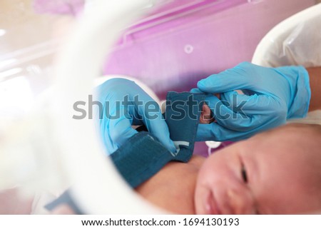 The salvation of a newborn baby in Pediatrics. Out of focusCopy of the space.