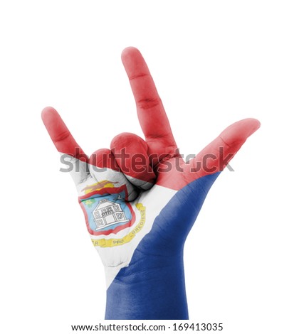 Hand making I love you sign, Sint Maarten (Neth.) flag painted, multi purpose concept - isolated on white background