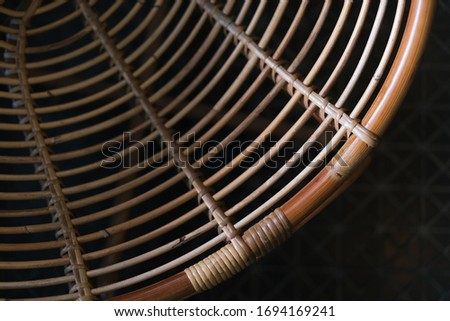 Close up of the vintage round shape Wicker chair in the cafe. 