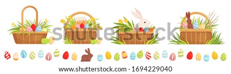 Set of Easter baskets for the holiday. Baskets with colored eggs, tulips, Easter cake and rabbit. Chocolate Hare Easter Egg Border Royalty-Free Stock Photo #1694229040