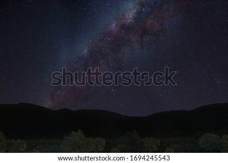 Milky way. Star gazing with mountain background