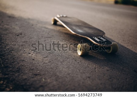 skateboard on the road with blurred background