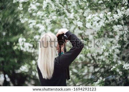 girl taking photos with a camera, online learning concept