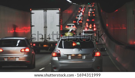 Traffic jam in urban tunnel vehicles in row Royalty-Free Stock Photo #1694311999