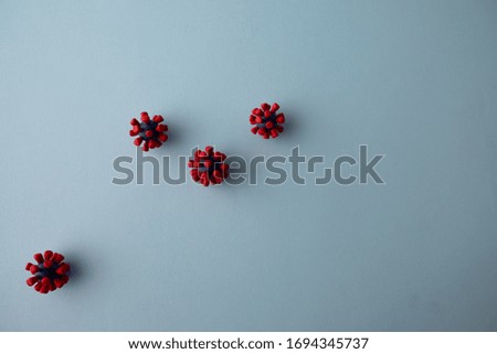 Plasticine model  of coronavirus bacteria 
or  other virus  on blue background. Place fo text
 Royalty-Free Stock Photo #1694345737