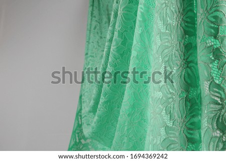 Delicate green lace on the table